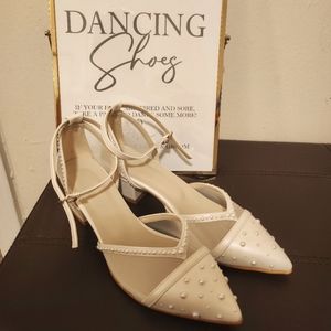 Custom made ivory, ankle strap wedding shoes.